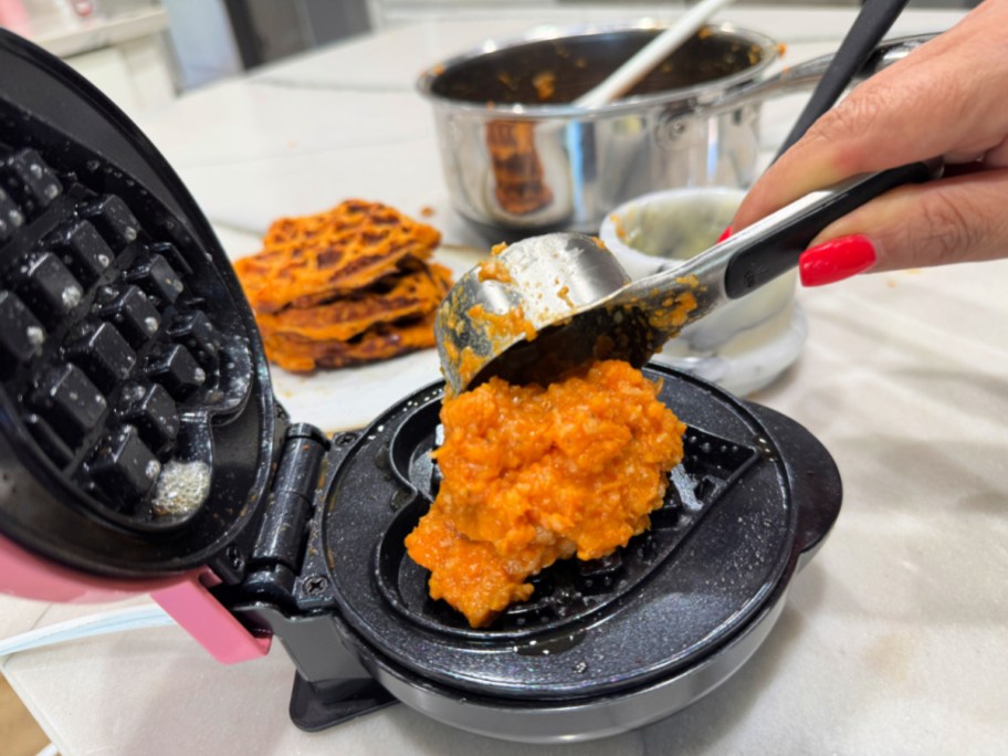 adding sweet potatoes to mini waffle maker