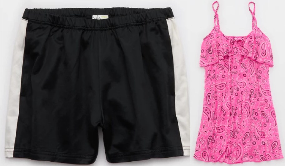 A side-by-side image showing black athletic shorts with thick white side stripes on the left and a pink paisley patterned dress with thin straps on the right.