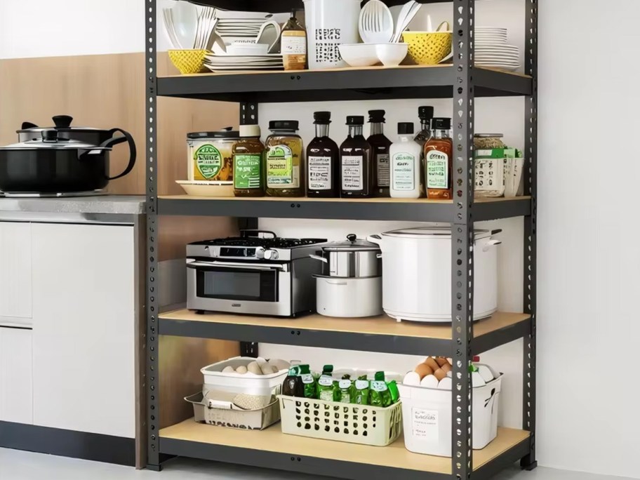 garage shelf with appliances and kitchenware on it 