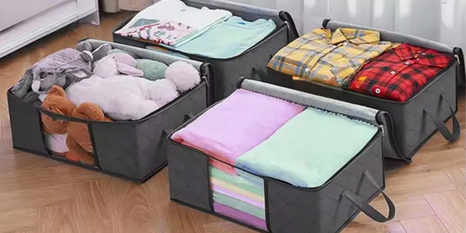 gray storage bags with clothes inside 