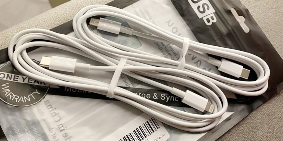 two iphone chargers on bag