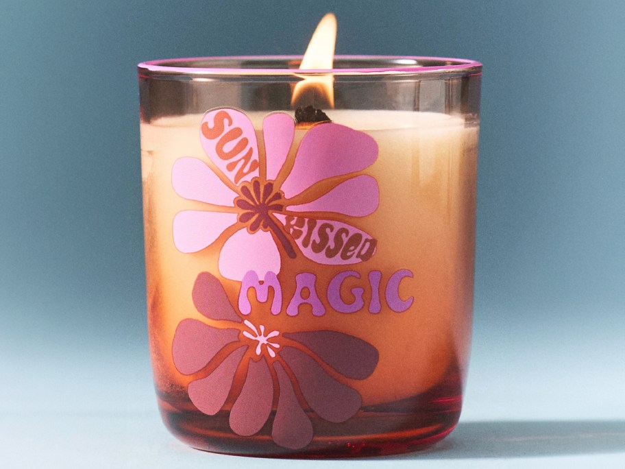 orange and pink flower candle 