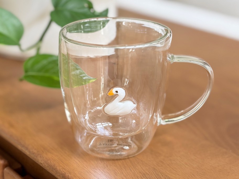 duck glass mug on table