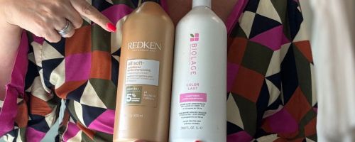 lina holding a redken and biolage liter