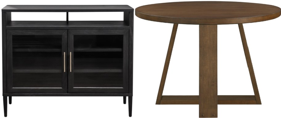 A black wooden cabinet with glass doors next to a round brown wooden table.
