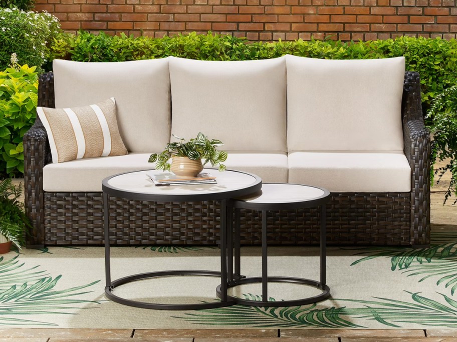 river oaks sofa with beige cushions 
