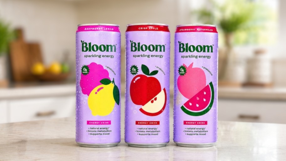 three cans of bloom energy drinks in Crisp Apple, Raspberry Lemon & Strawberry Watermelon