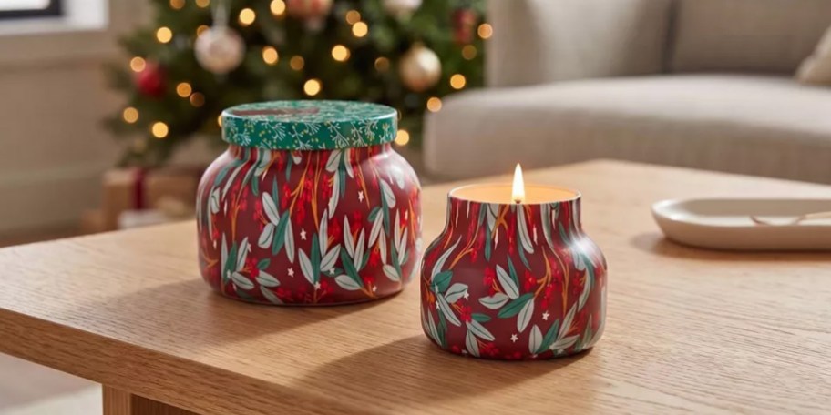 red and green holiday candles on table