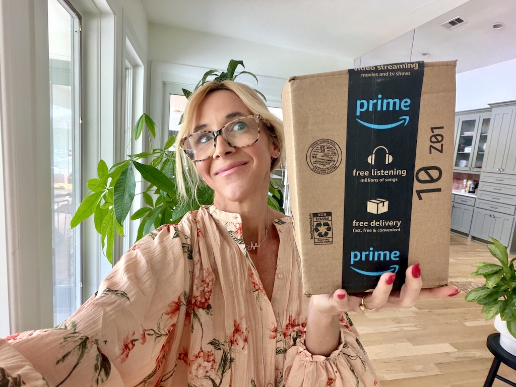 Collin holding Amazon prime box