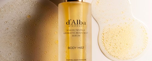 yellow bottle of d'Alba White Truffle Aromatic Body Mist Serum