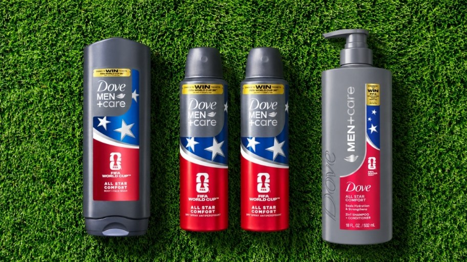 four mens body care product arranged in the grass