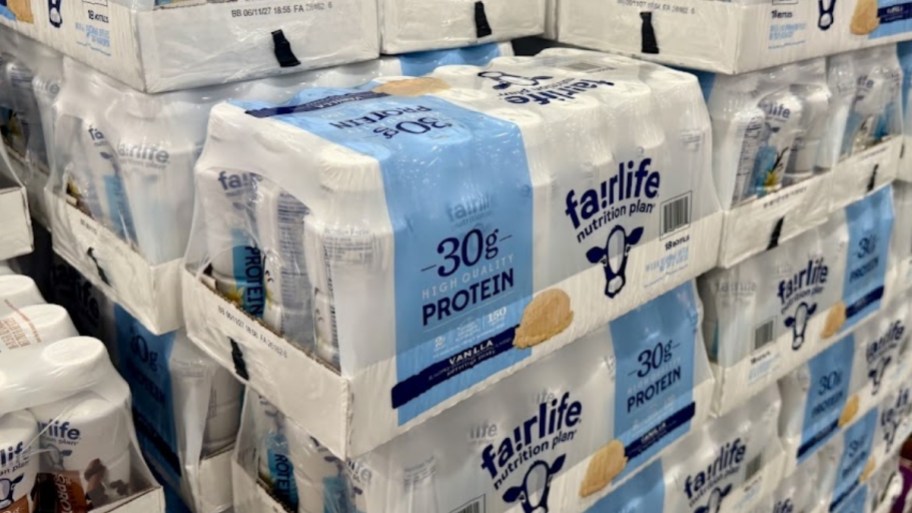 fairlife vanilla protein shakes stack on a palette in a store