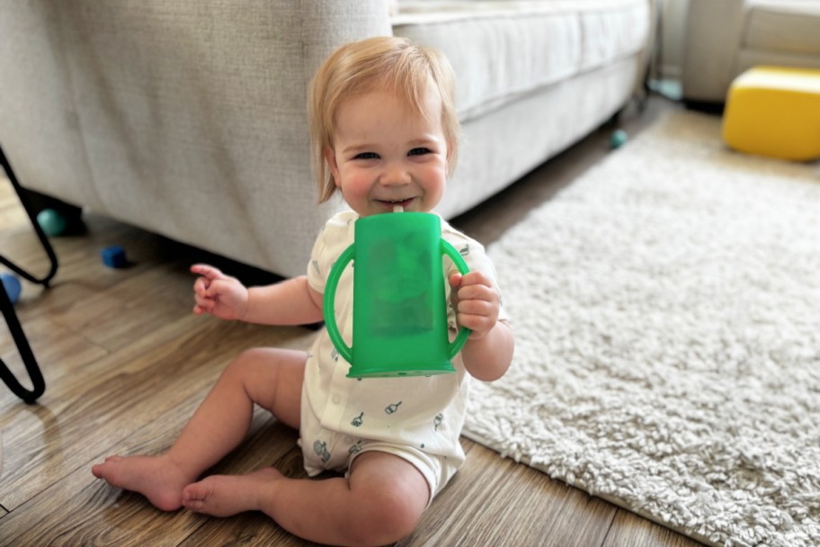 toddler holding a flipping holder