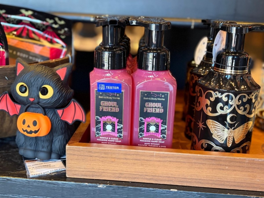 foaming hand soaps and dispensers on display in a store
