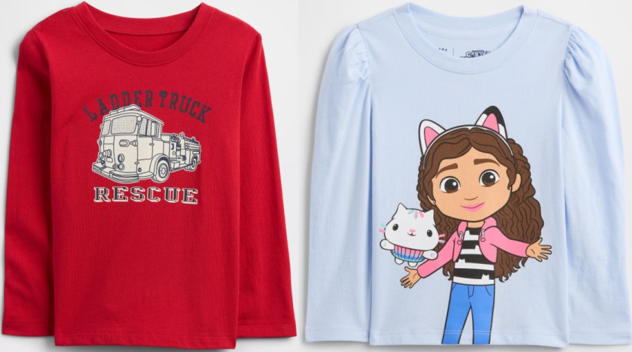 Two long-sleeve shirts: the left is red with a graphic of a fire truck and the word "RESCUE," while the right is light blue featuring a cartoon girl with brown hair, wearing cat ears, holding a cupcake and holding a white cat.