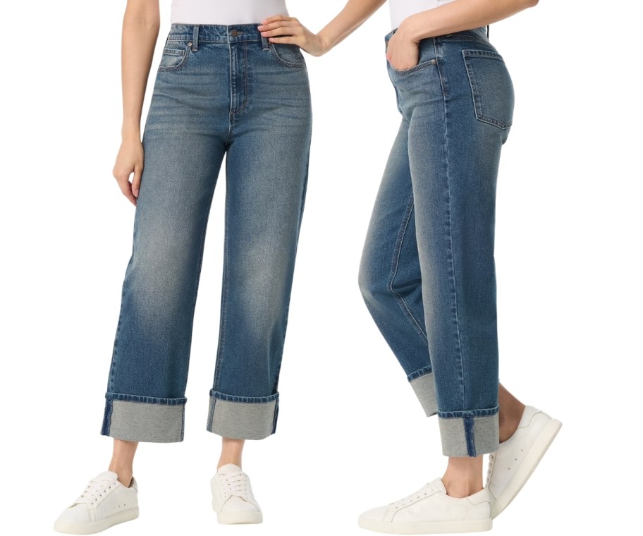 a woman wearing a pair of cuffed jeans