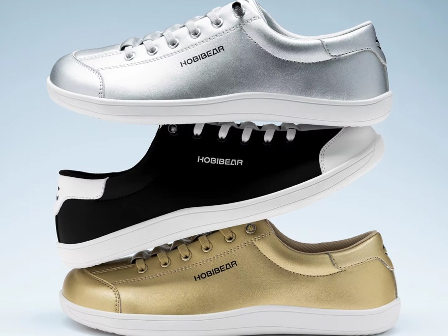 silver, black, and gold hobibear shoes