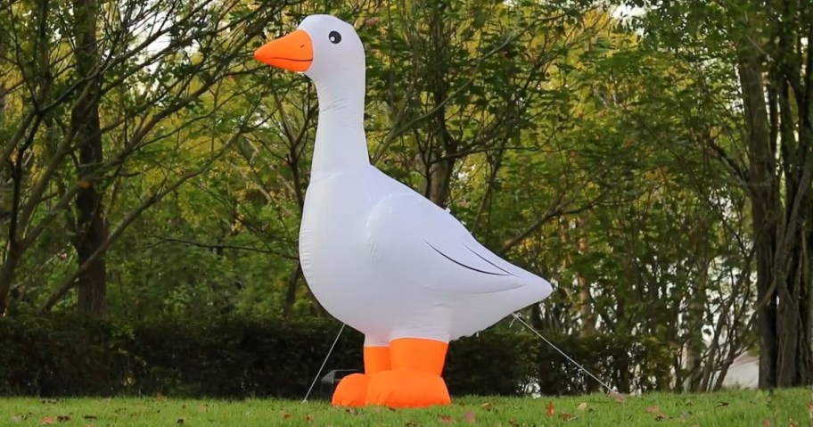 a large inflatable goose in a yard
