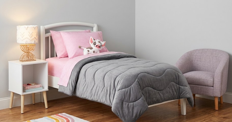 kids bedroom with gray and pink bedding