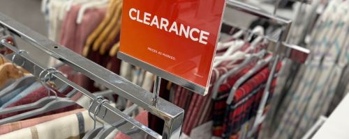 kohls clearance sign on rack in store