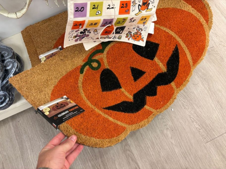 Halloween Doormat in hand in store