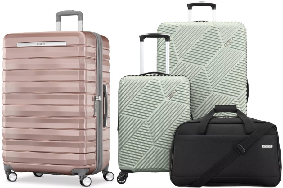A matching travel set including a large rose gold hardside spinner suitcase on the left, two sage green hardside spinner suitcases of varying sizes in the center, and a black duffel bag on the bottom right.