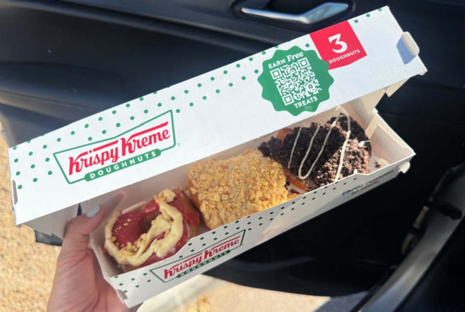 box of three krispy kreme doughnuts