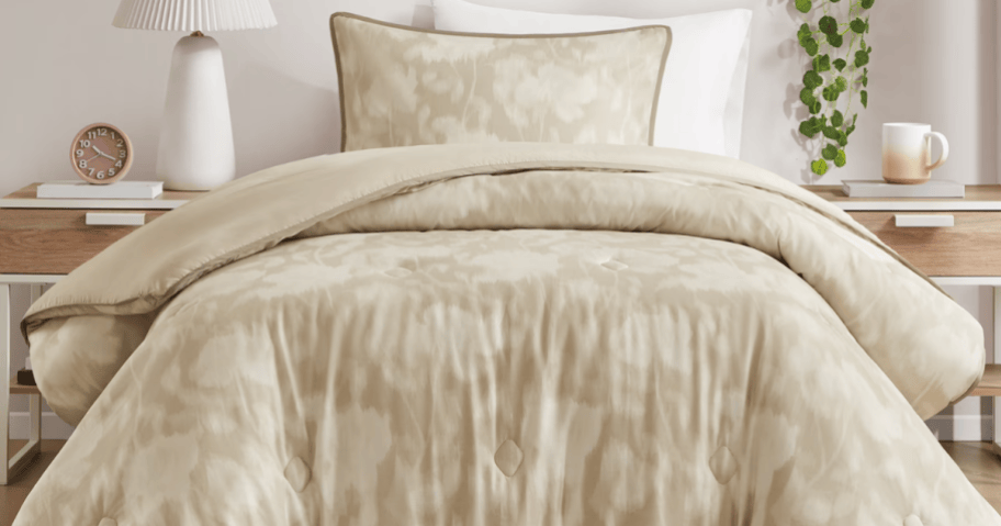 beige bedding on a bed
