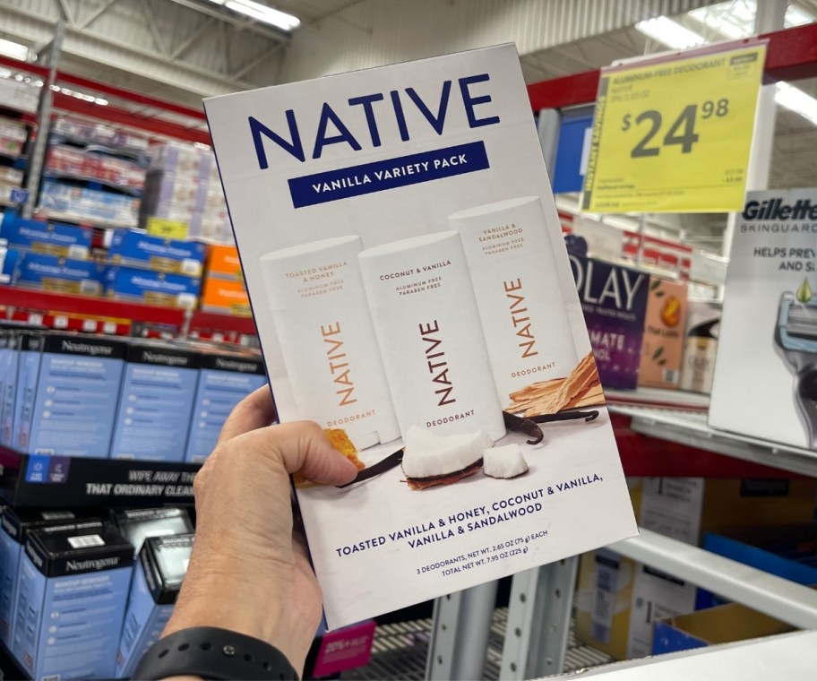 womans hand holding a native deodorant 3-pack