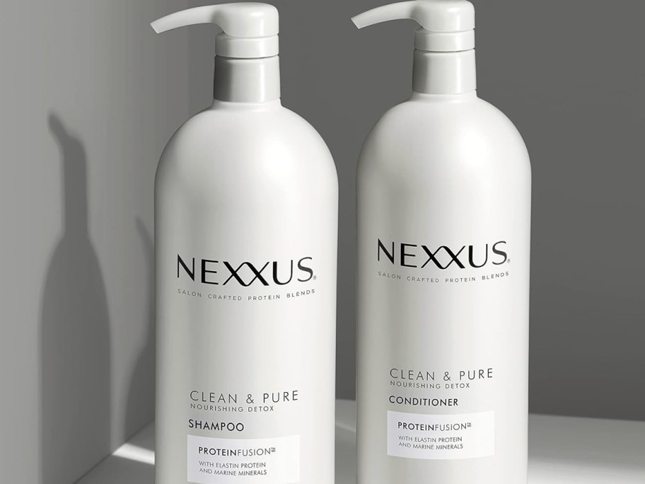 white nexxus shampoo and conditioner bottles 