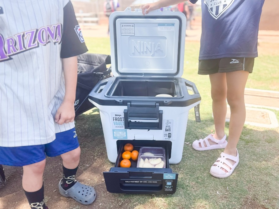 kids next to an open Ninja Frostvault cooler