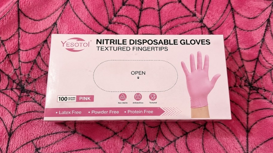 a 100 count box of pink nitrile gloves