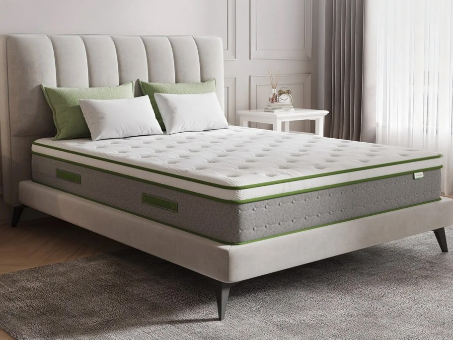 mattress on gray bedframe 