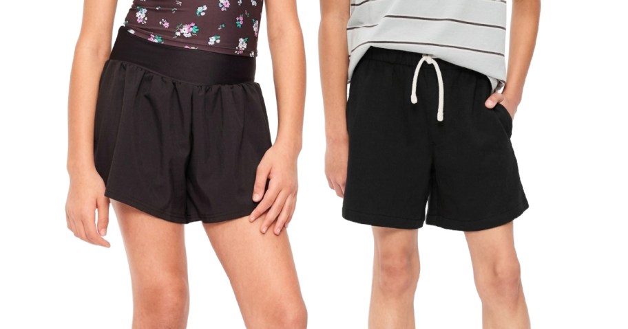 boy and girl wearing black shorts
