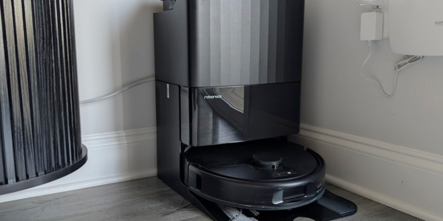 black rombot vacuum mop on dock