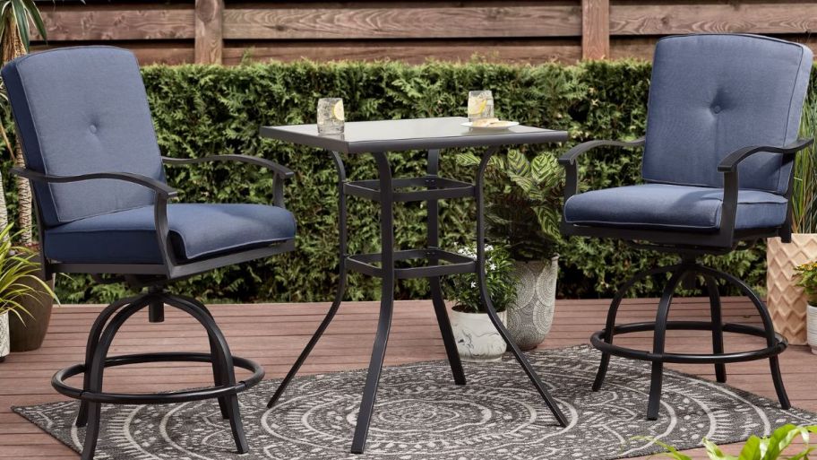 rocker bistro fancy set displayed on a rug outdoors 