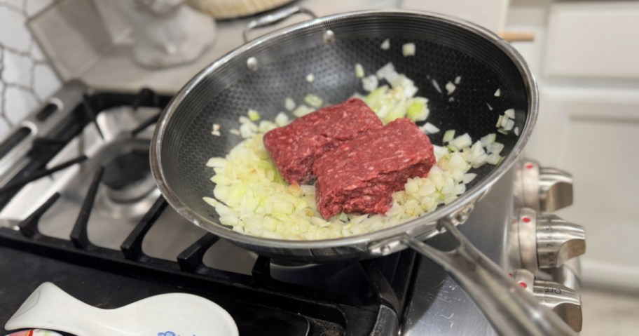 skillet with meat and onion