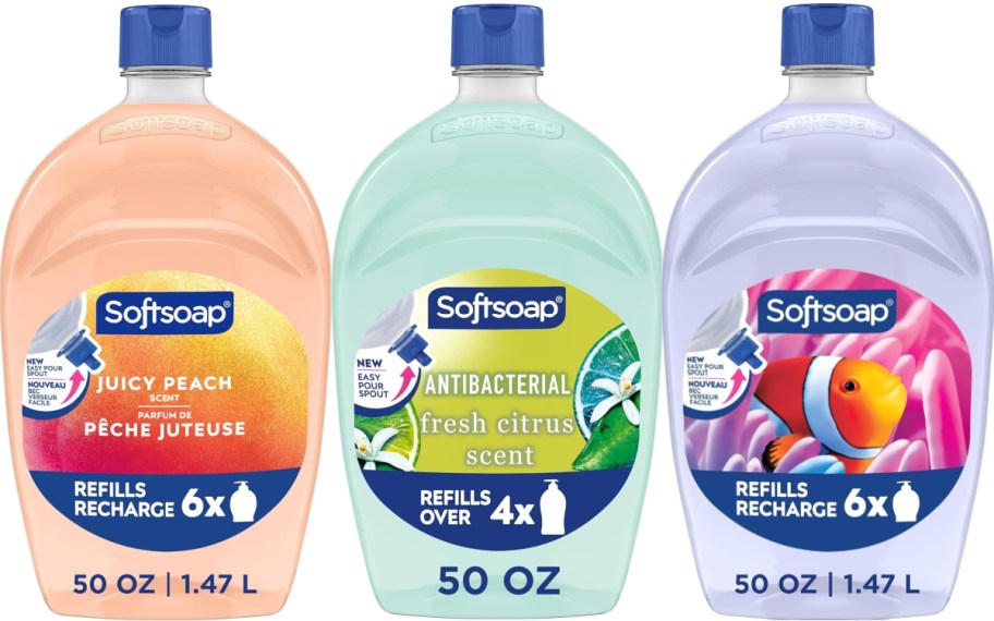 Three large Softsoap hand soap refill bottles side-by-side against a white background: Juicy Peach, Antibacterial Fresh Citrus, and an aquarium design.