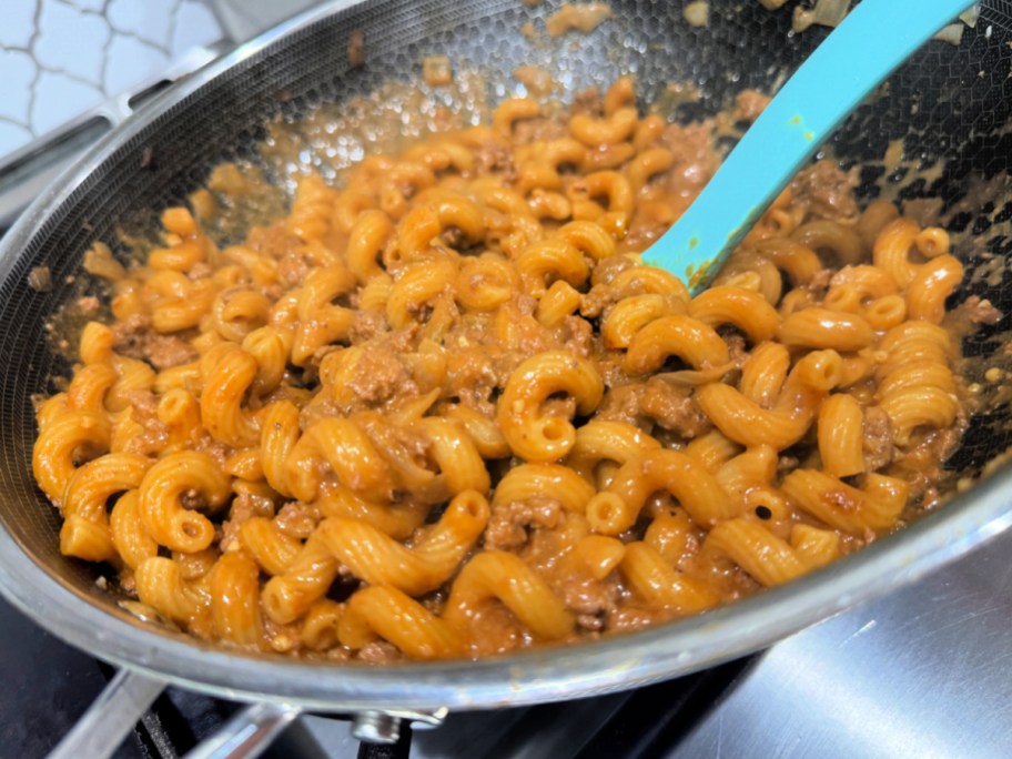 stirring homemade hamburger helper