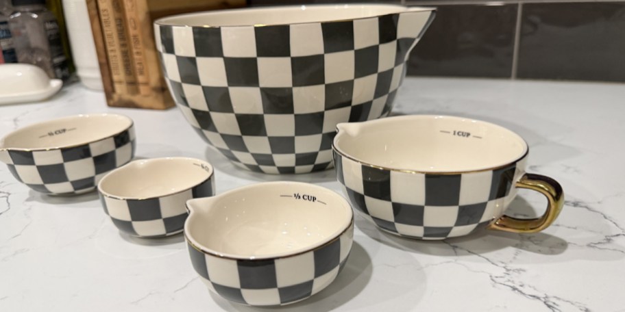 checkered ceramic mixing bowls on counter
