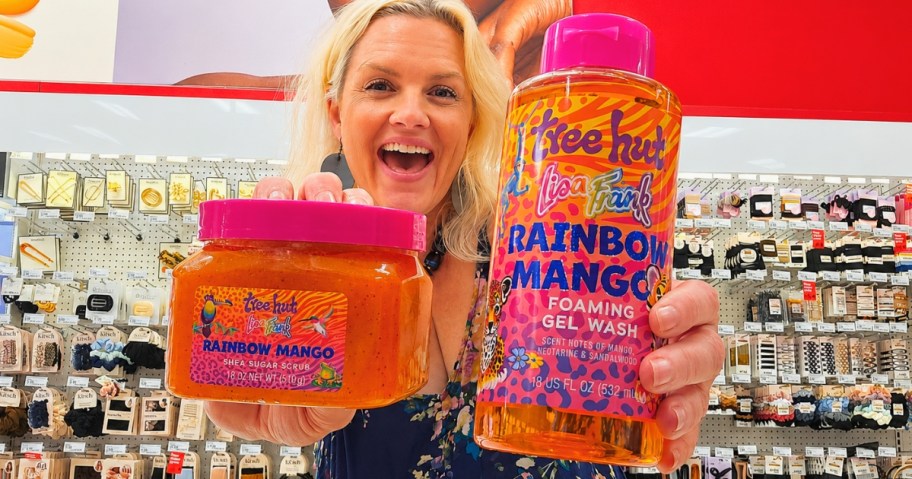 woman holding up a Tree Hut x Lisa Frank Body Scrub & Body Wash