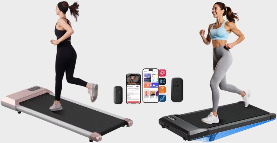 two woman running on treadmills