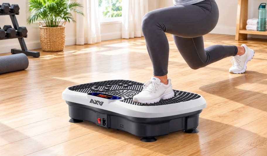woman working out on a vibration plate