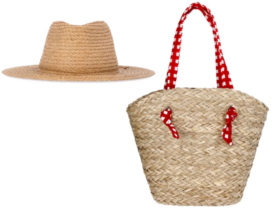 straw hat next to straw bag with red handle