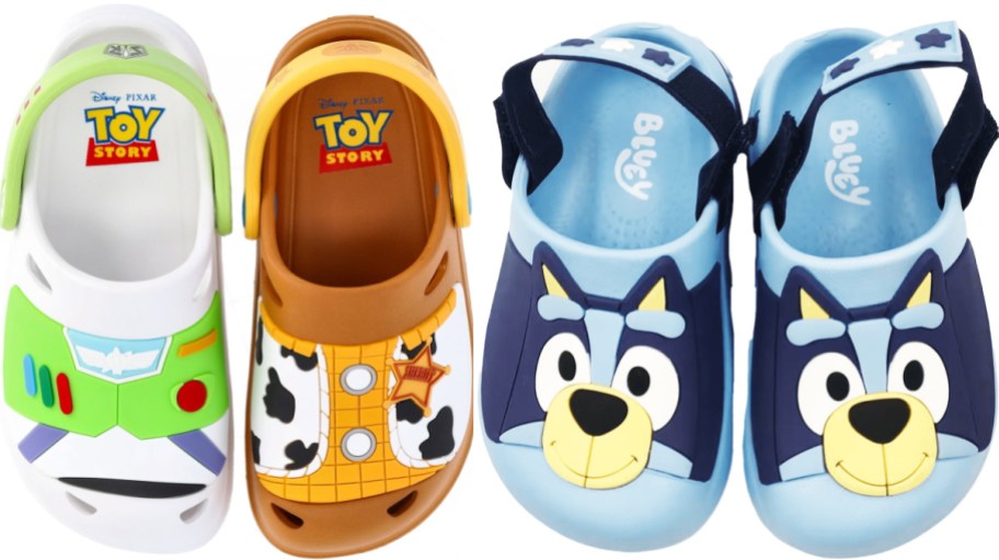 Two pairs of children's clogs side-by-side: a mismatched Toy Story pair featuring Buzz Lightyear and Woody, and a blue pair featuring the character Bluey.
