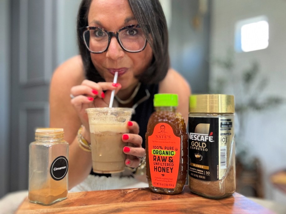 woman drinking a vanilla honey latte