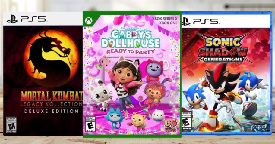 Mortal combat, gabby doll house and Sonic video games on top of a wooden table