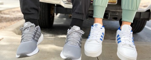 men and women wearing adidas shoes