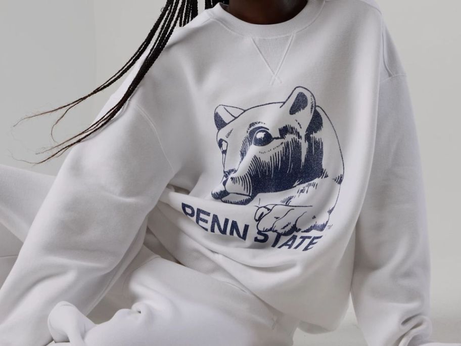 woman wearing sweatshirt from Aerie Collegiate Collection