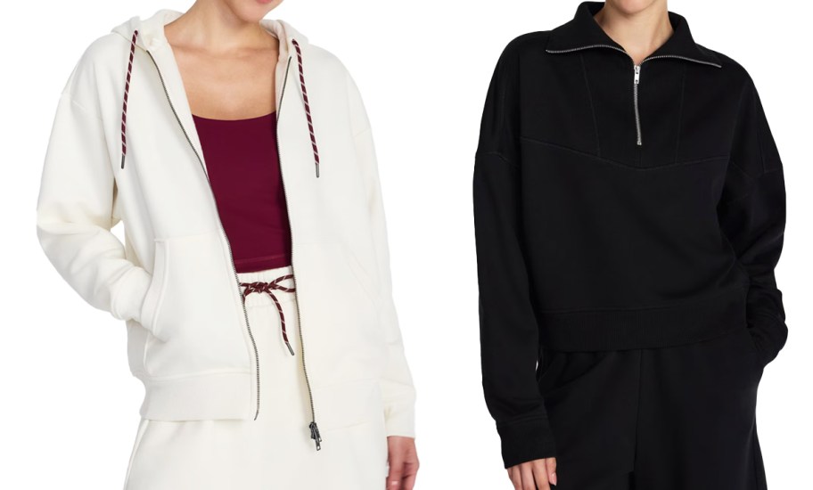 two women in white and black sweatshirts